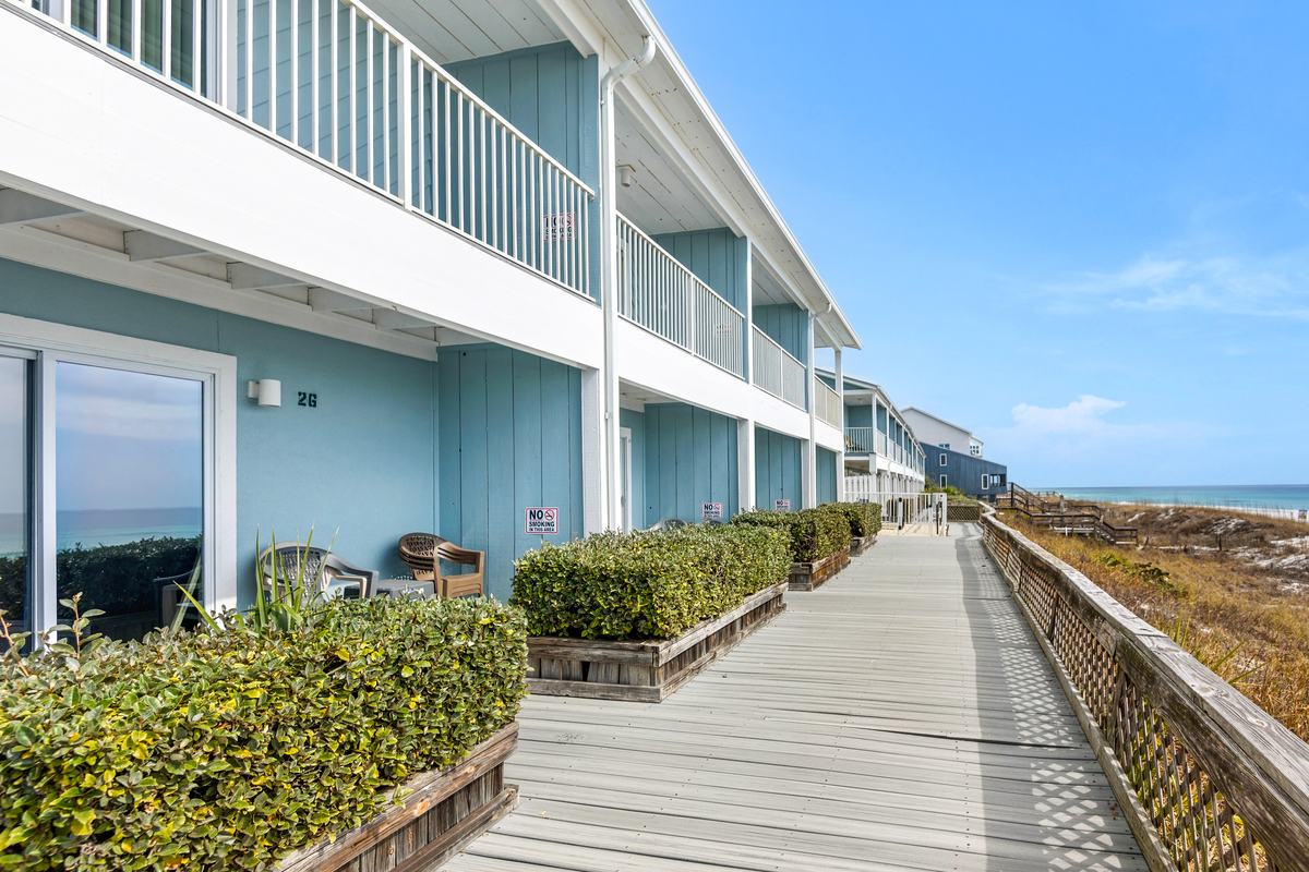 Guest room buildings and walkway at Sea Oats Motel